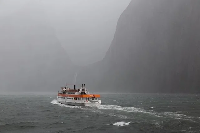 Trying to snap a photo in the pouring rain and gale force winds without getting blown off the boat was a challenge.
