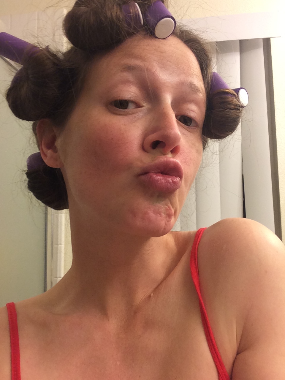 This is Bryon's new favorite picture of me. I was being silly in the bathroom; but I think it suits this situation :) It says "kiss my sweet booty," to anyone who can't be nice to my family! Also, it says, guess what?! I love how easy it is to be nice to my wavy/curly hair with these soft curling rods!