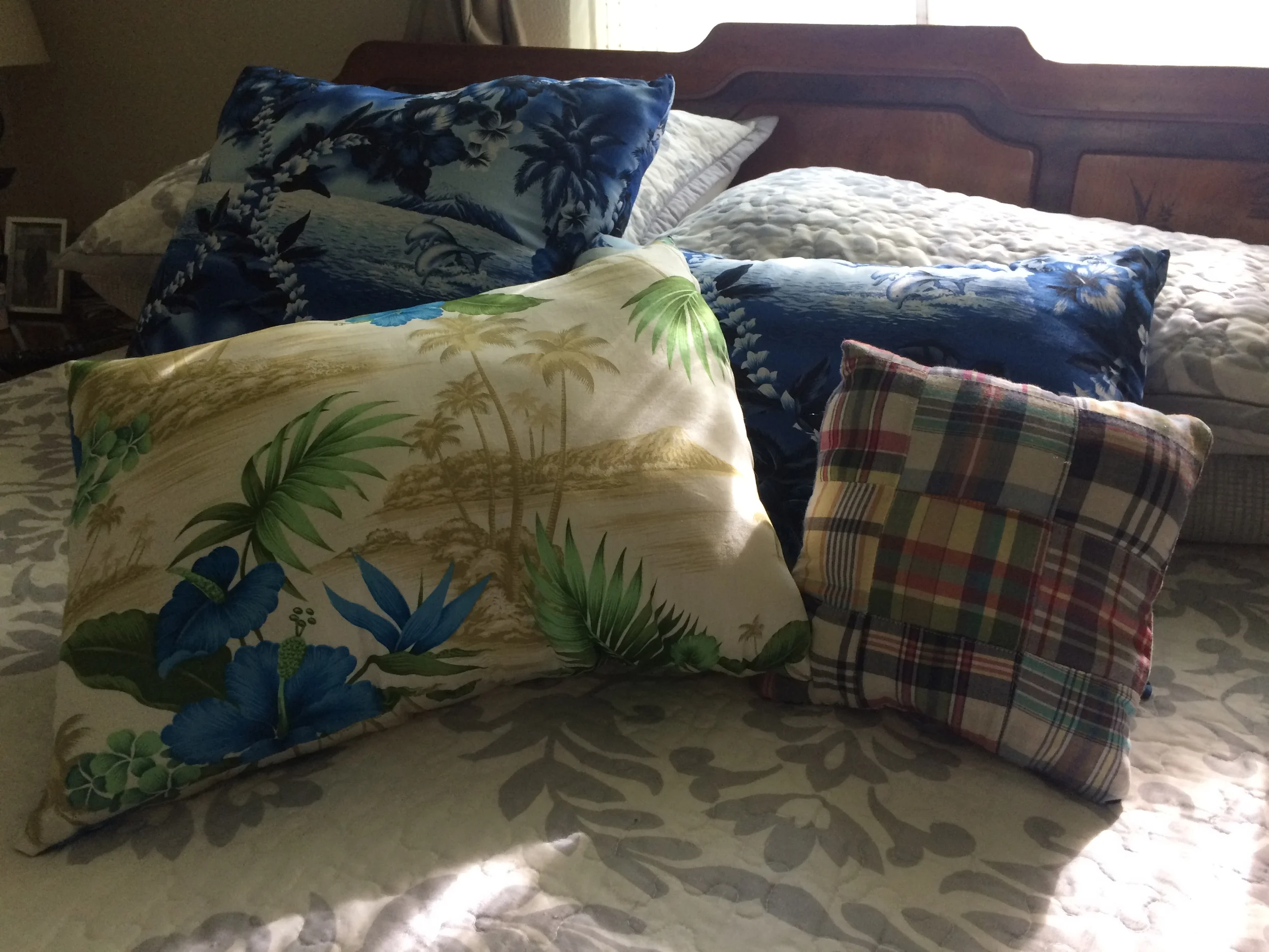 Why Hawaiian? I don't know, really. I think I've always wanted a bed like Blanche Devareaux had in The Golden Girls. I think they look pretty okay with the plain bed, anyway.