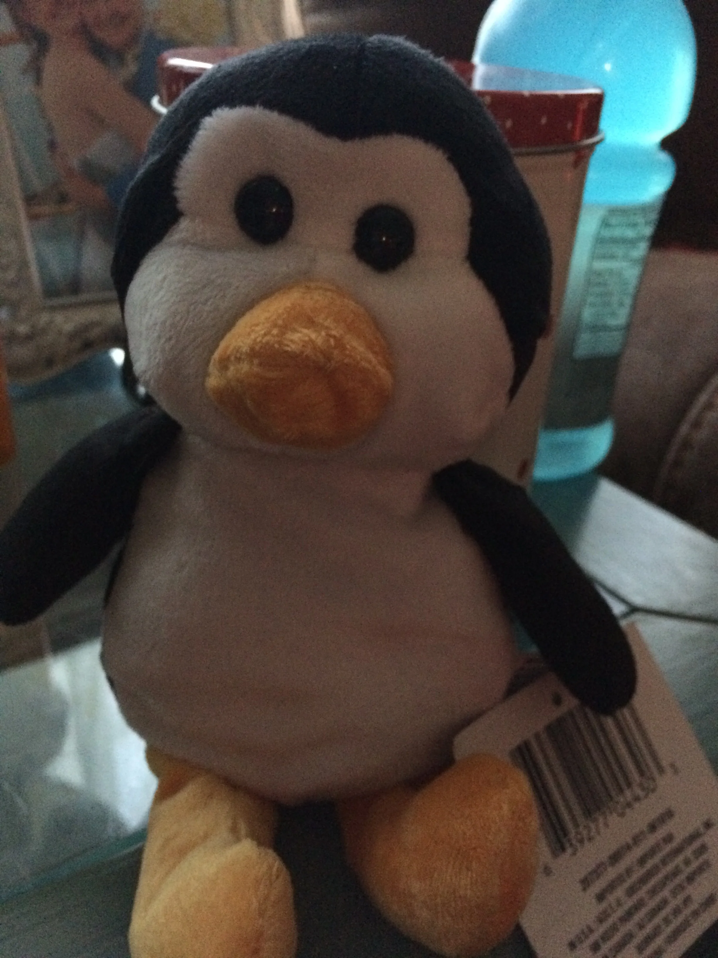 A very special present, from a very special boy. He bought this for me, with his own money. He sacrificed a treat for himself, to get me a gift, because he saw that a penguin was available in the school store, and he knew I like penguins. My boy, as challenging as he can be, is the sweetest, most generous person I know and I am grateful to know him, every day of his life, even if there's Gatorade behind this little dude, being given to him in hopes of stemming a headache.