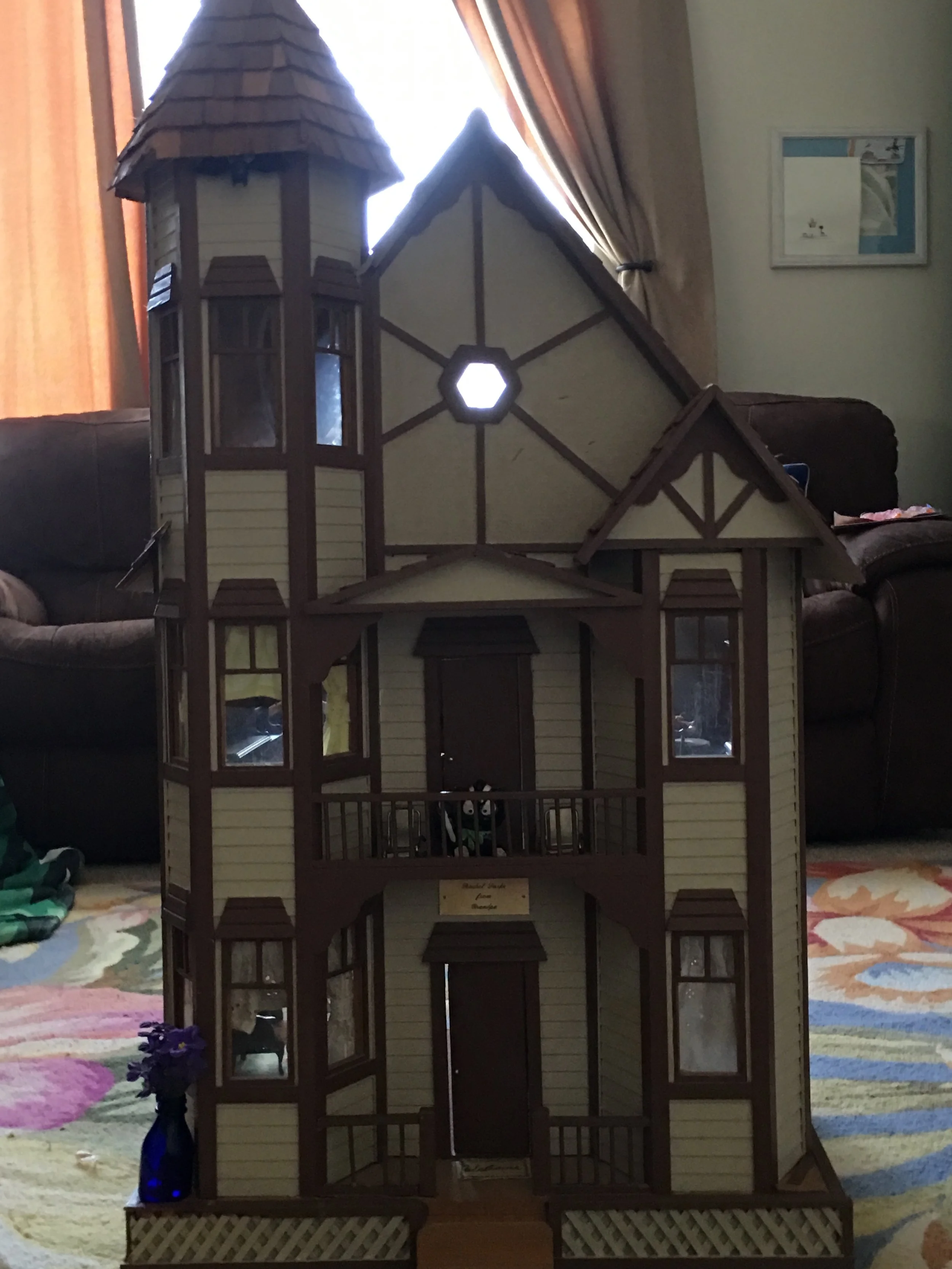Ta-Da! It's not in too shabby of shape. Some shingles have broken off, and some random bits and bobs, but it's in decent shape. I was most concerned about the brass plaque and it's still there. It's engraved with a message from my grandpa. I'm so happy to have it, and I'm so excited to make it my own. Collin is excited to work on it with me. It will be a fun project for us, as a family. And, a way to honor my "grumpa."