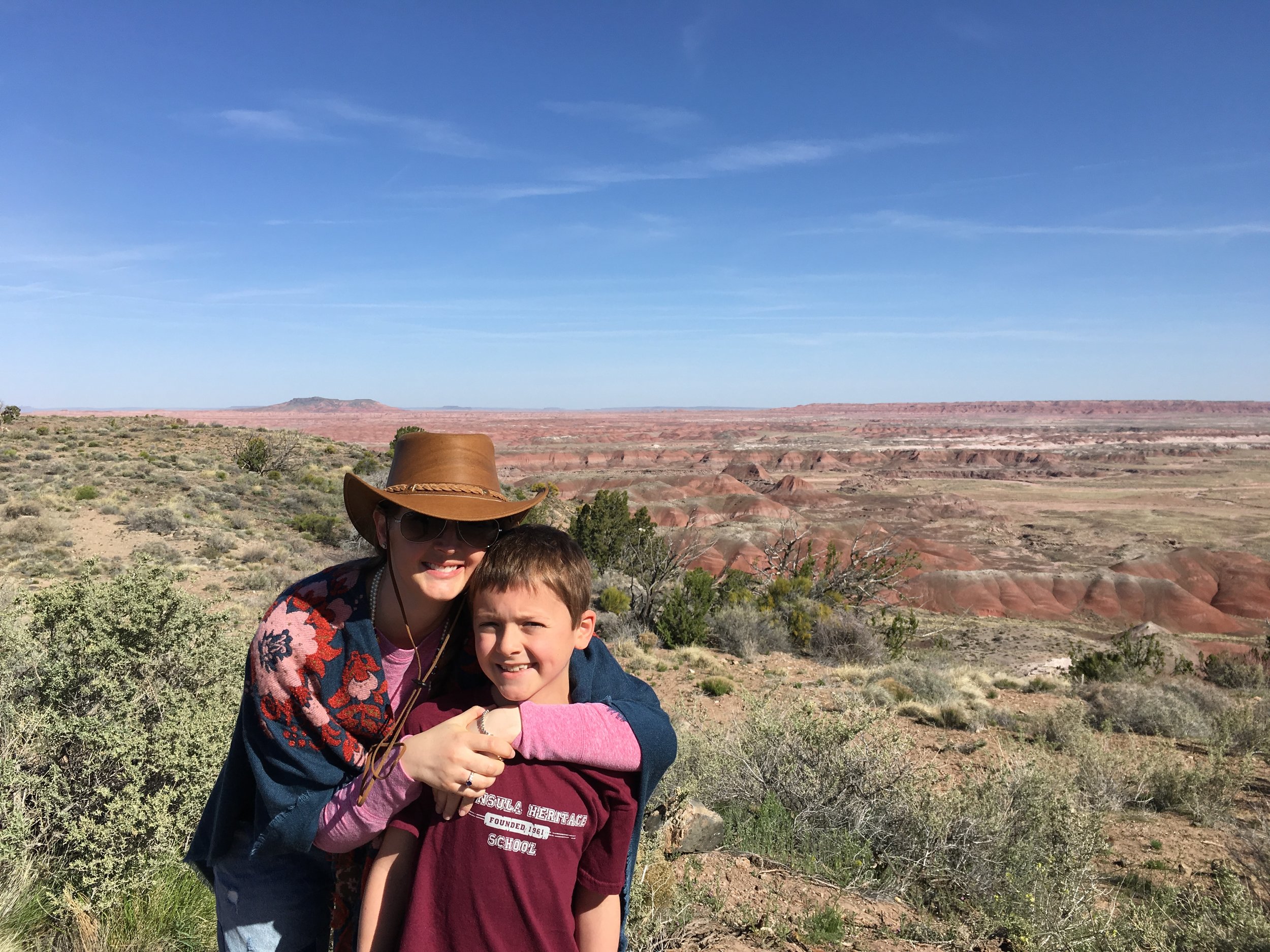 My son and I on our last stop before heading home. He loved the petrified forest because he got to navigate. I loved it because I felt like my hat really "went" with my outfit. Bryon said he wasn't sure that my hat purchase was going to "go" with my clothes. I told him it would absolutely "go" with all of my clothes, that I practically dress like a weirdo. Then, the next day, I wore patched jeans, a blanket shall cowboy boots and my hat and he had to eat his words. The day after that, i wore a flowered dress, and my hat and if I'd have let him, he'd have had to eat the damn hat. I was destined for the hat and the hat was destined for me. I am the hat and the hat is me. We are one. Loco mamacita. But you have to admit, it does go, no?