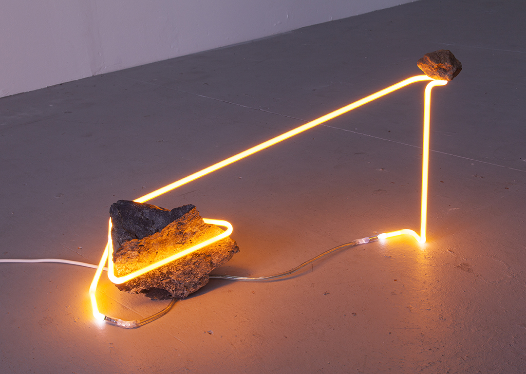 an outline of a thought as it refers to its inner self #2, 2016 neon, modified rock, 38cm x 61cm x 20cm / 15" x 24" x 8"