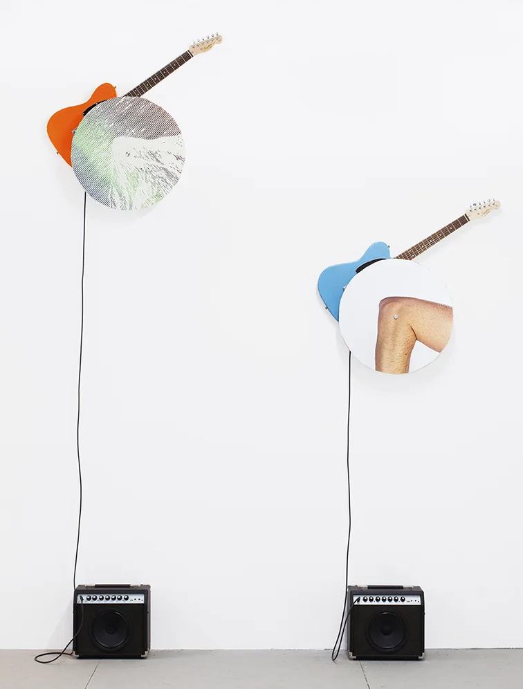 rotational relevance, 2019 two inkjet prints, cast acrylic, guitars, amplifiers, cables, rotating motors, 221cm x 297cm x19cm / 87" x 117" x 7.5"