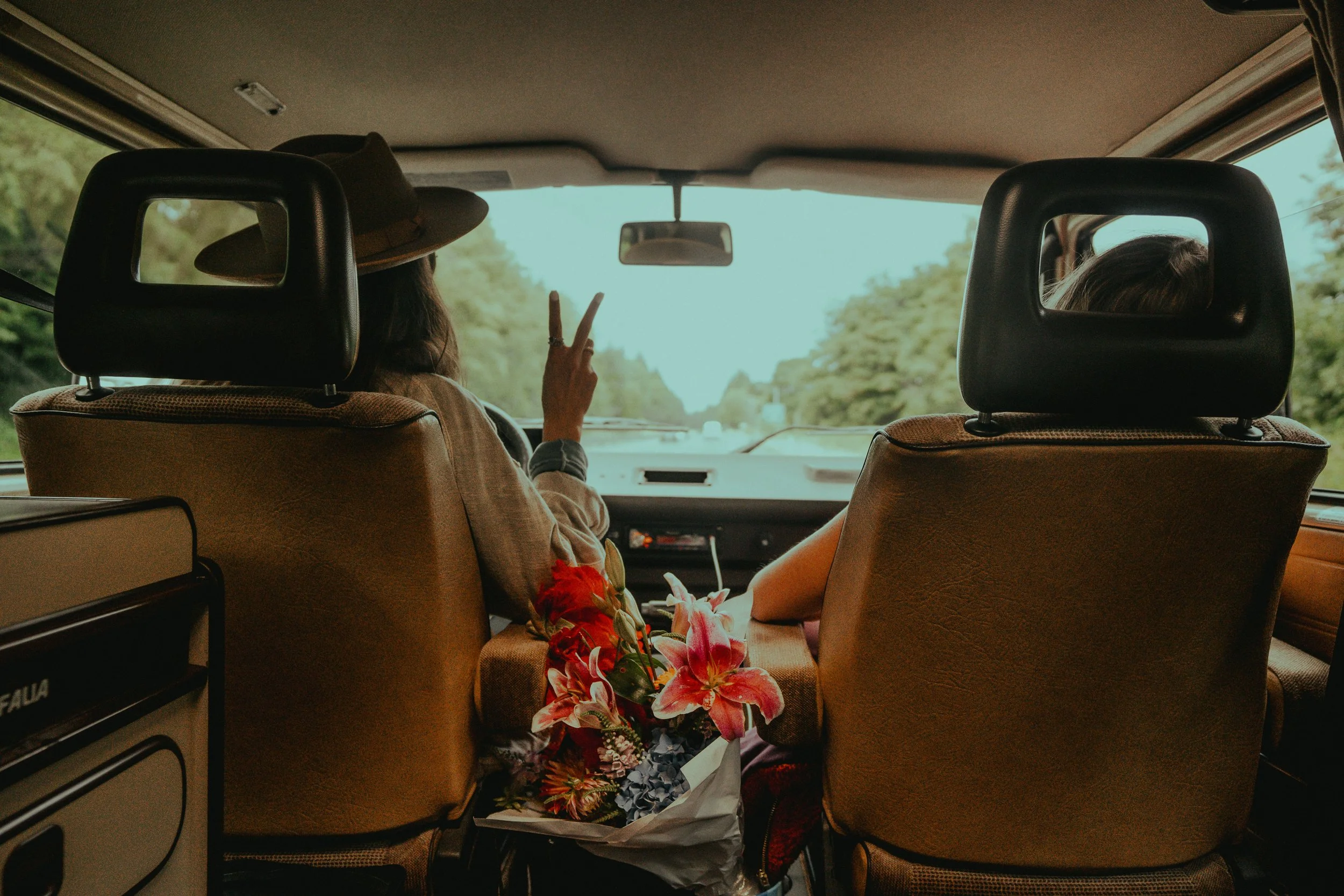 OUR 8 FAVORITE PODCASTS FOR ROAD TRIPS