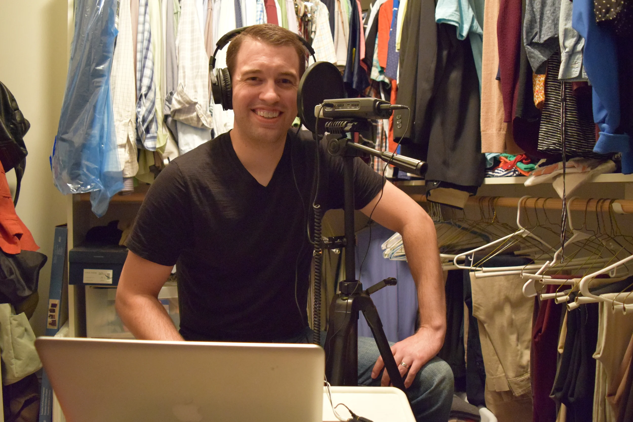 Yes, I am recording in my walk-in closet. It's by far the quietest room in the house, and the clothes actually do a great job of reducing echo. I wanted a picture of this first interview so I can compare someday when I've made some equipment upgrades.