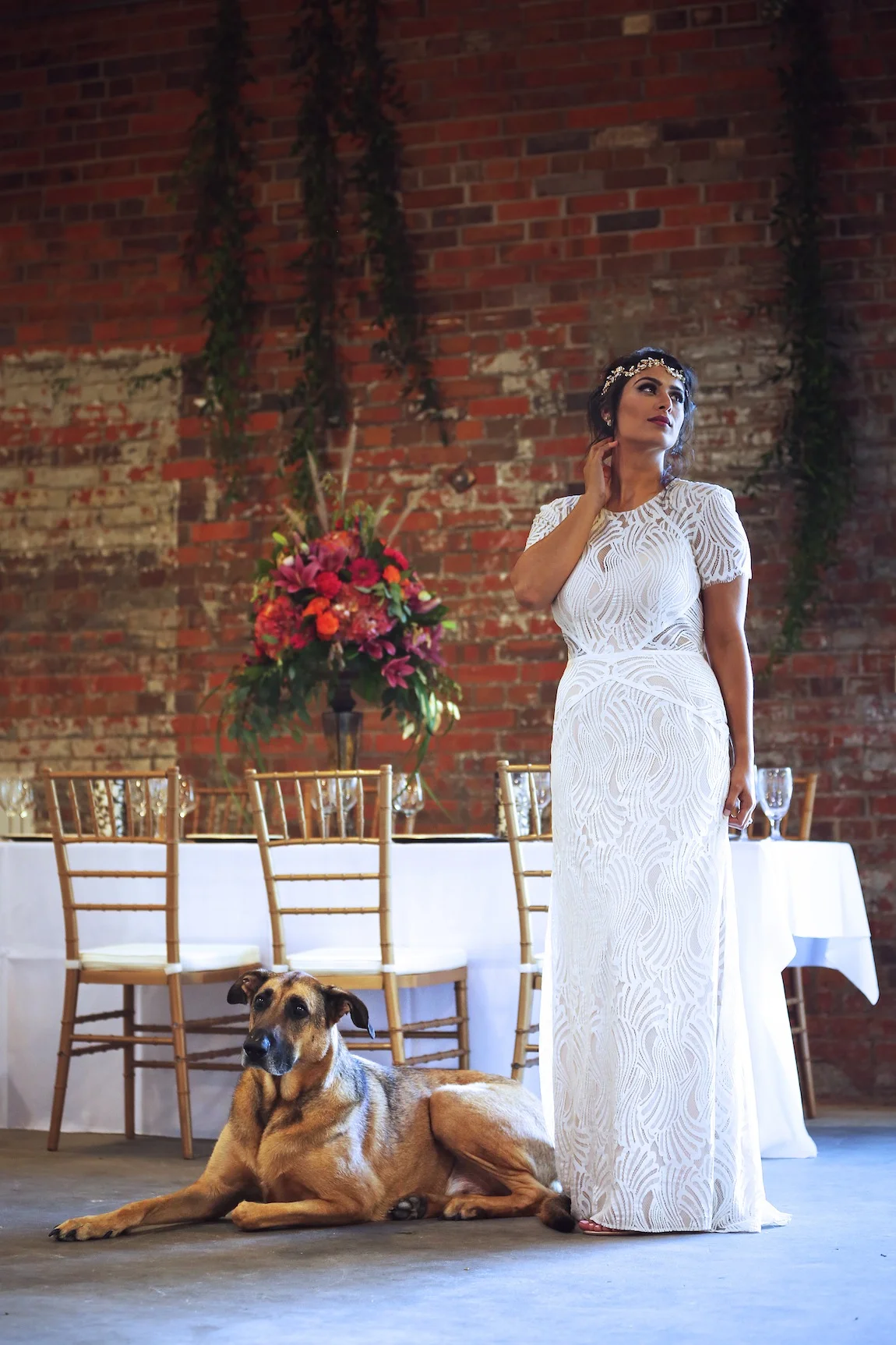 Photo of a bride with a dog showcasing our wedding venue