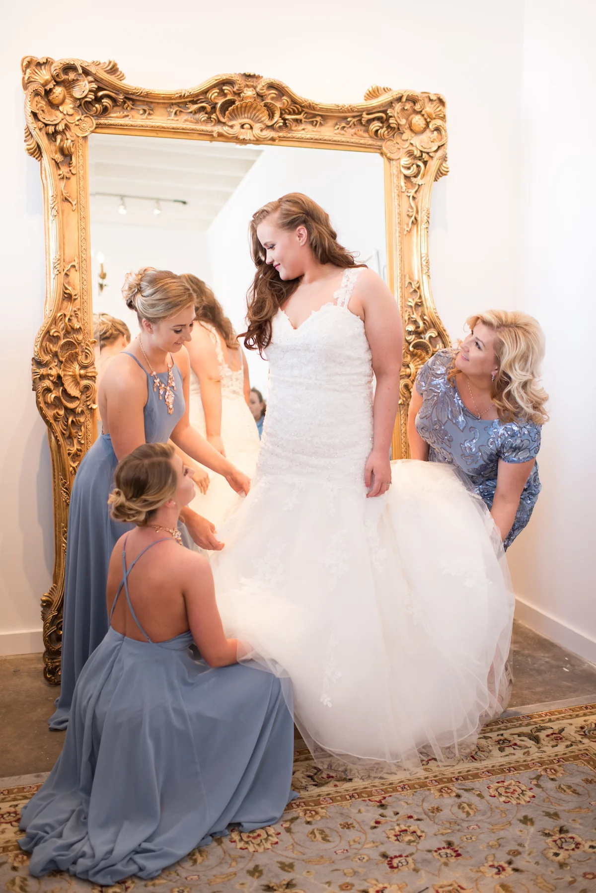 Taryn in front of the luxurious full size mirror in the bridal suite