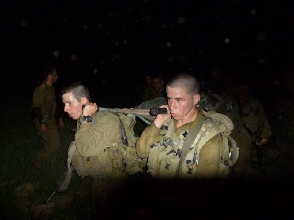 Nothing fun or health about stretcher carry...Final march before joining the combat platoon.