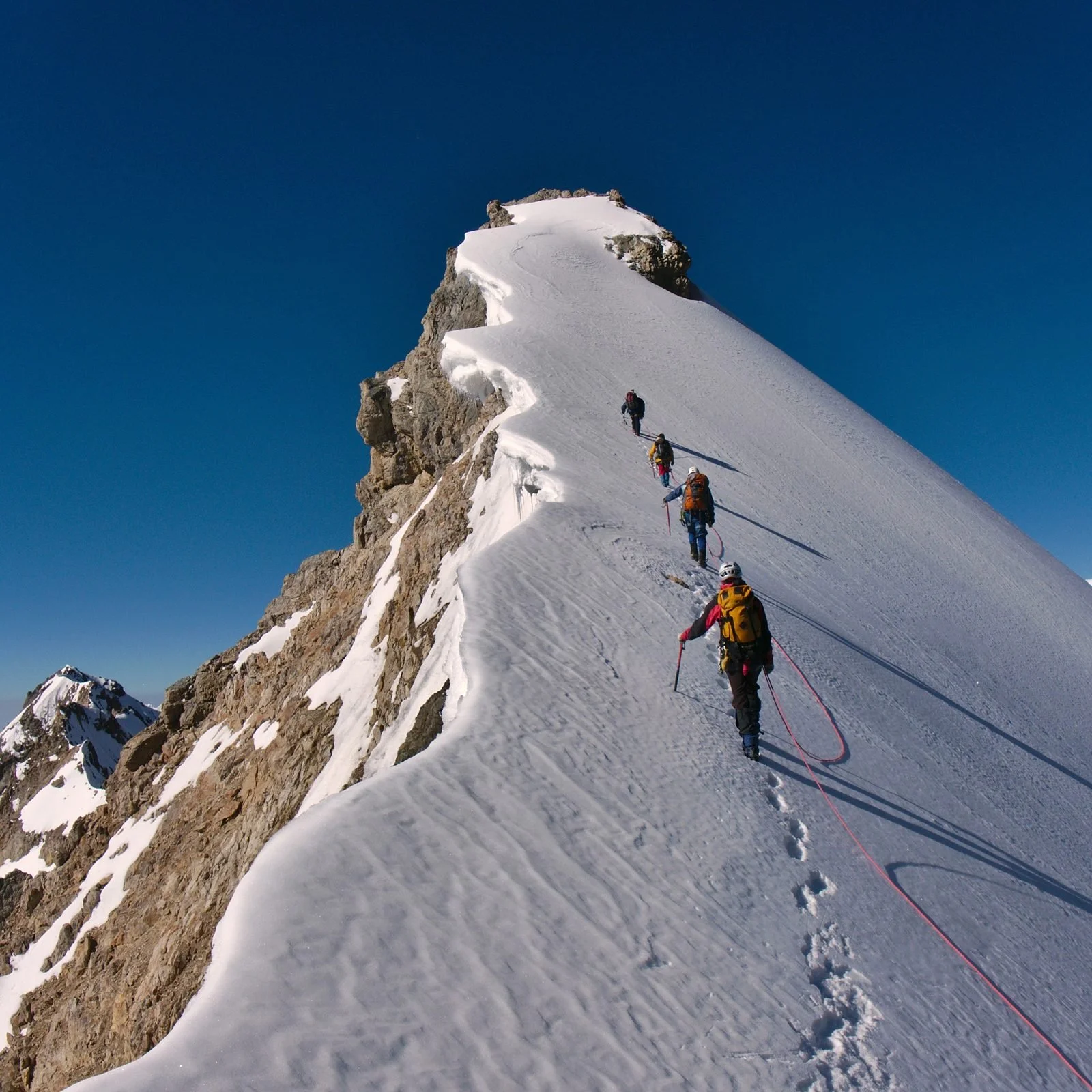 roped-mountaineering-team-alpine-ridge.jpg