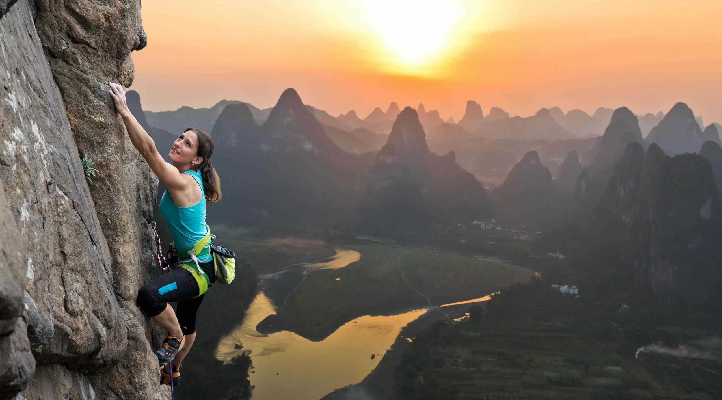 rock-climber-sunset-cliff.jpg