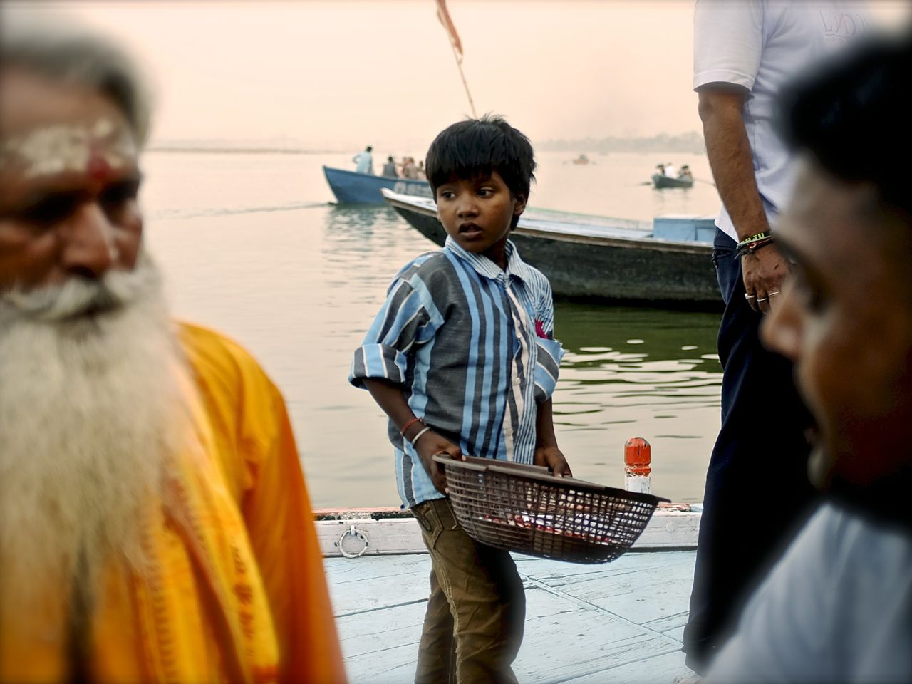 Young boy selling candles