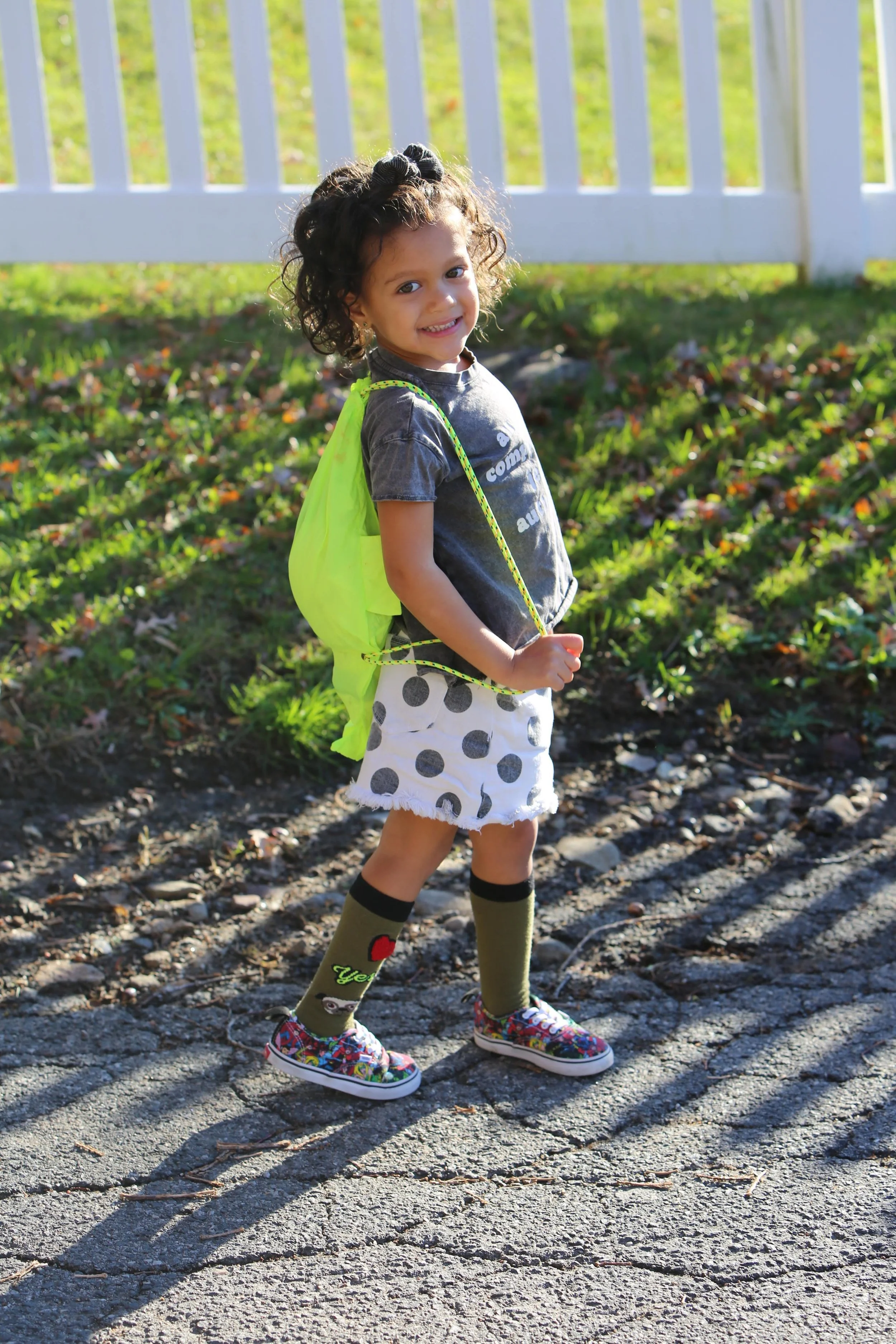During the summer, play up the neon tones with a bag or other bold accessory.