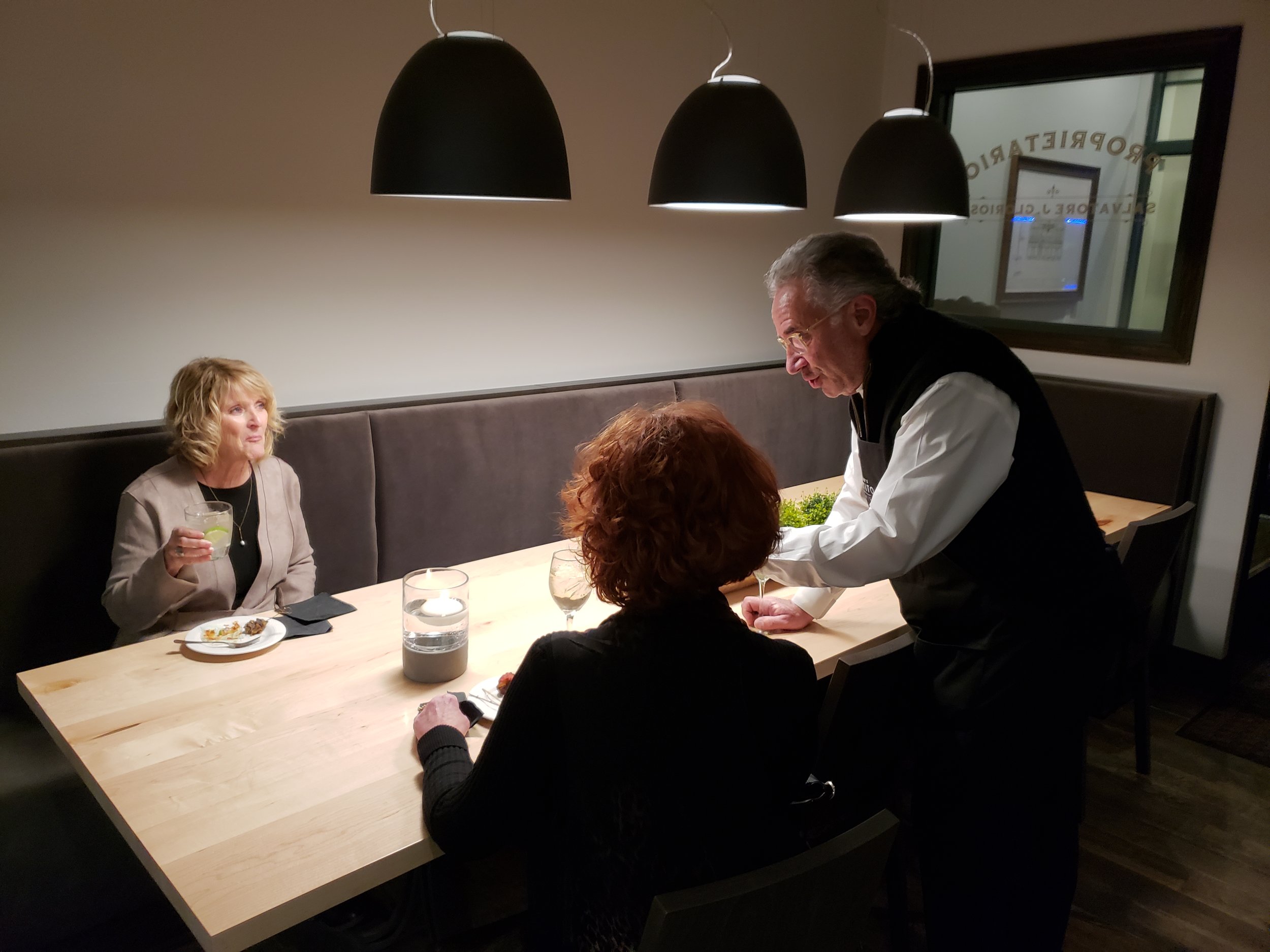 Michael Glorioso talking with guests about Glorioso’s Appetito