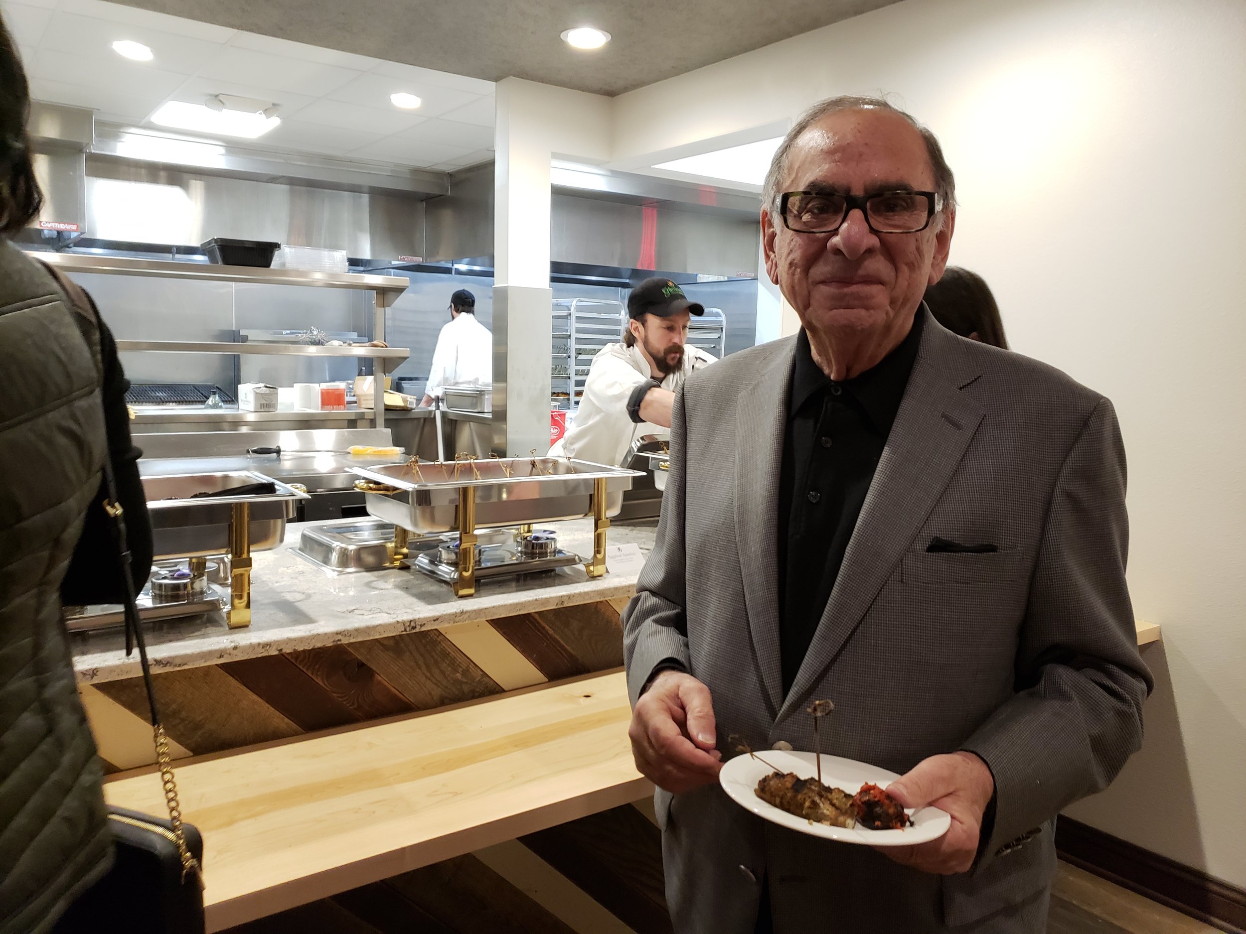 Ted Glorioso enjoying beef spiedini in the cucina