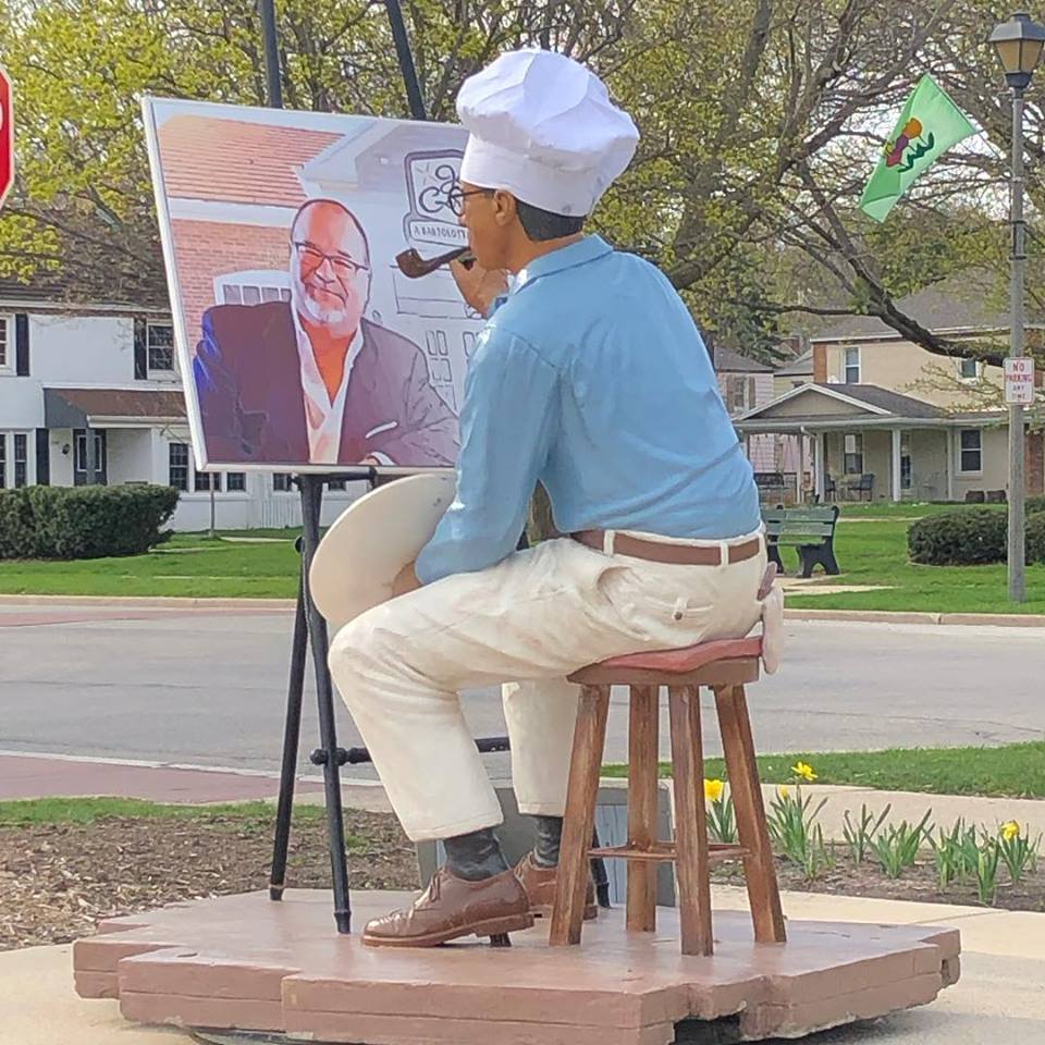  The Village of Greendale pays tribute to Joe Bartolotta with the statue of Norman Rockwell painting the iconic restaurant operator. Joe Bartolotta started Joey Gerard’s - A Bartolotta Supper Club in the historic downtown Village of Greendale. 