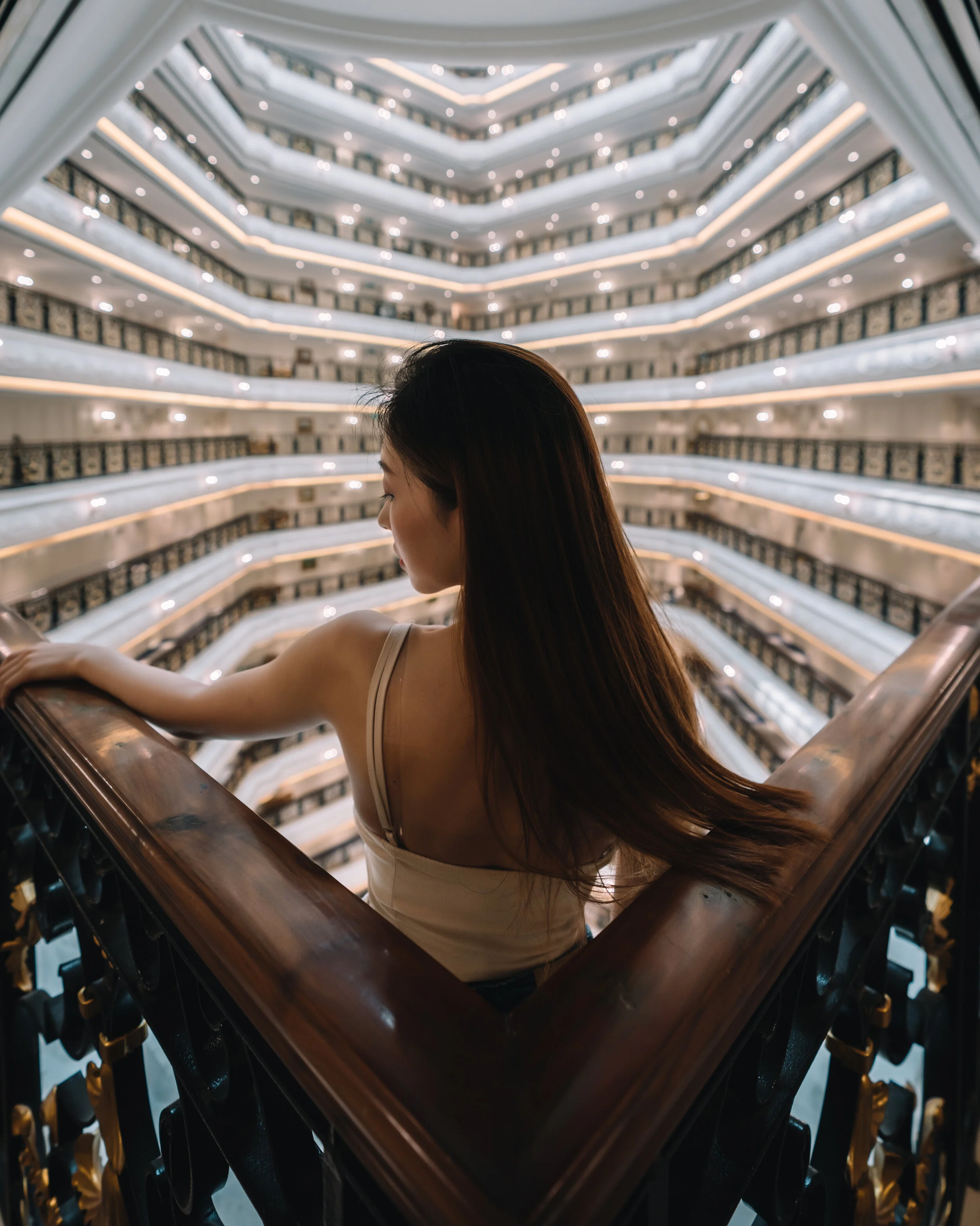 A girl standing at the edge of a building | Urban extreme indoor portrait photography | Beijing, China | Tristan Zhou (@trystane)