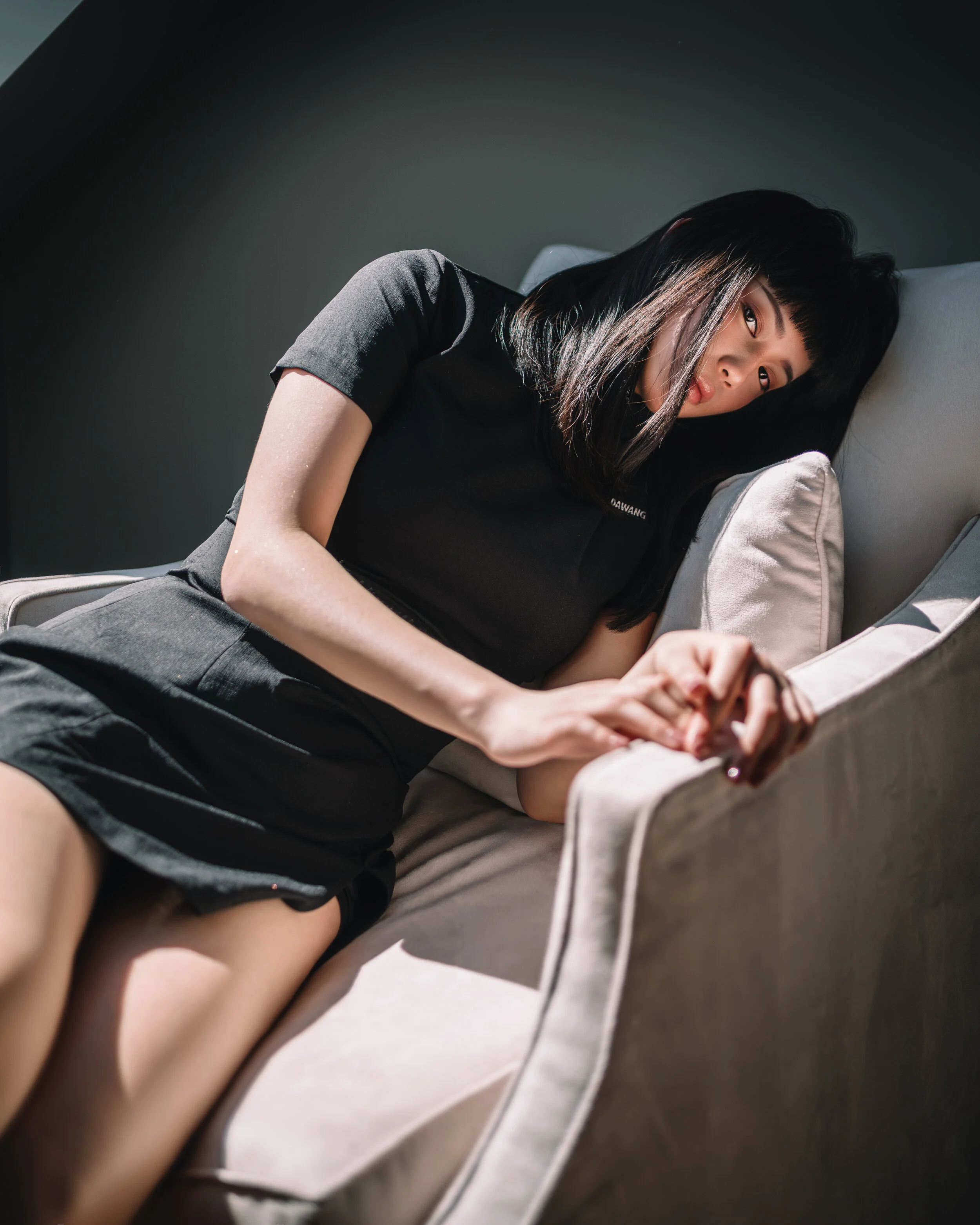 A girl sitting on a cozy chair | Moody lifestyle portrait photography | Seattle, WA | Tristan Zhou (@trystane)