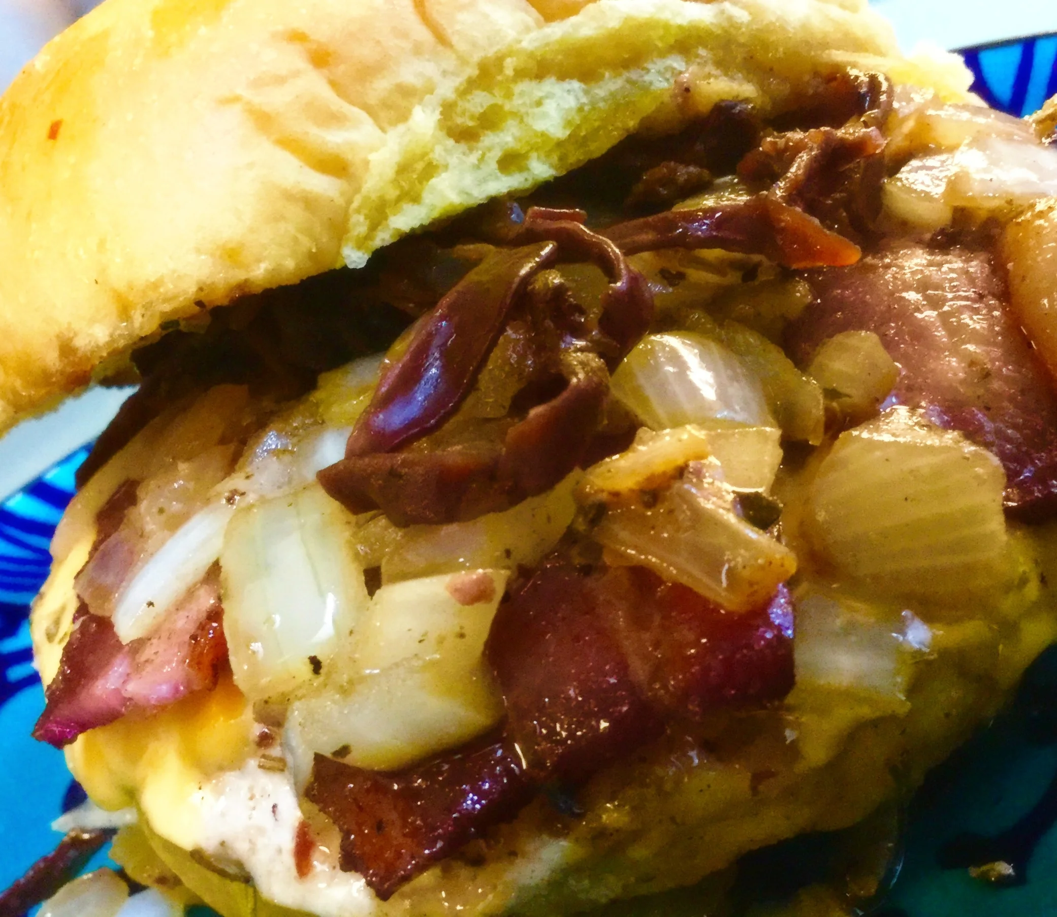 OMG! This one's with onions, garlic, bacon, pickled mushrooms American & Jack Cheeses; oh, and there's a turkey burger under there, somewhere!