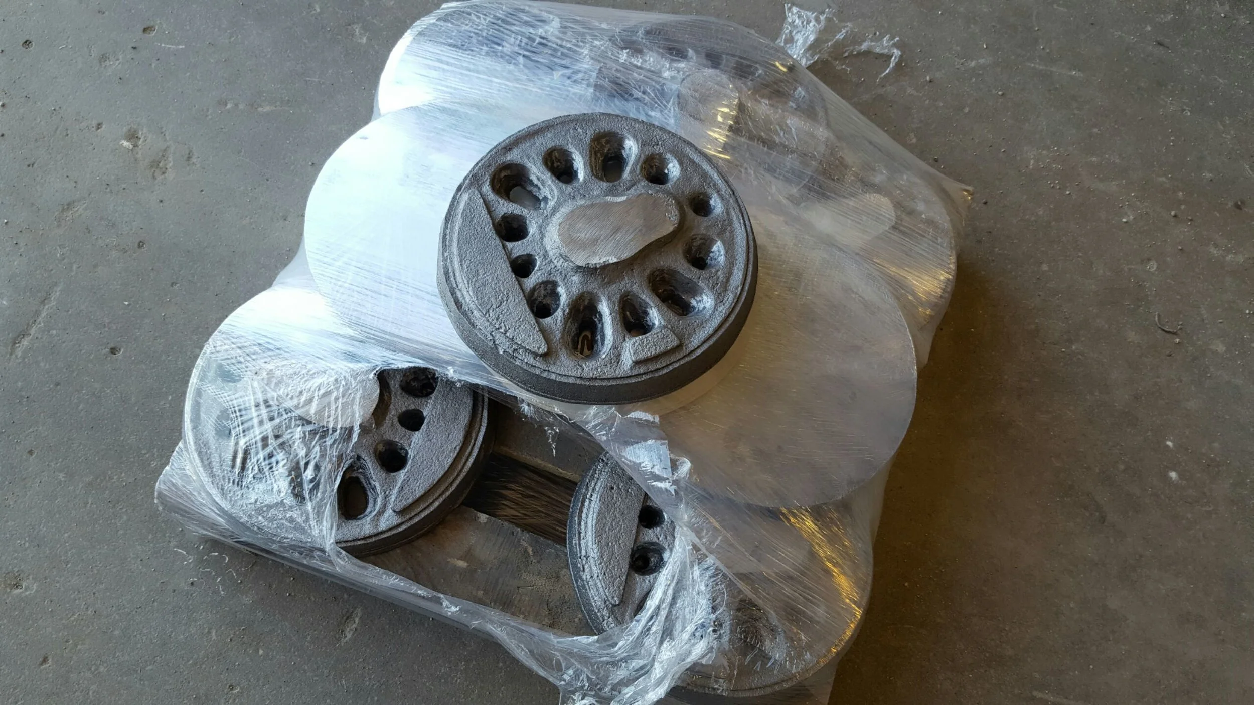 Here is an example of custom rough boxpok castings for a custom locomotive. we did final machining and added steel tires. patterns were 3d printed and wheels were cast from gray iron.