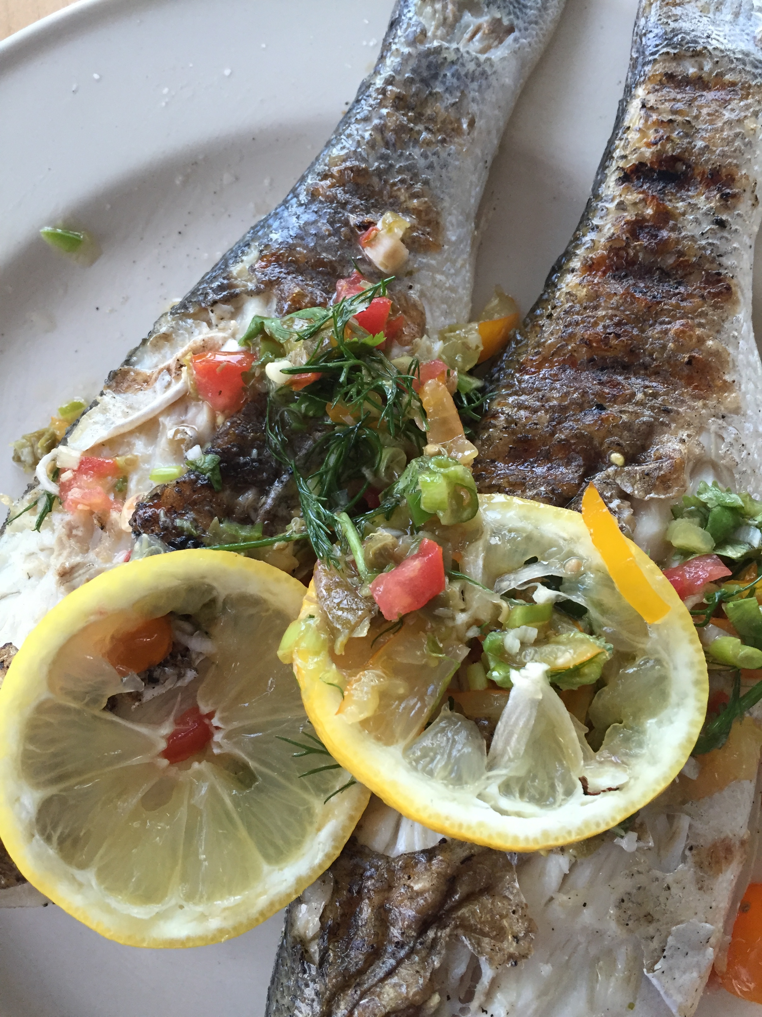 whole branzino, grilled with lemon and herbs