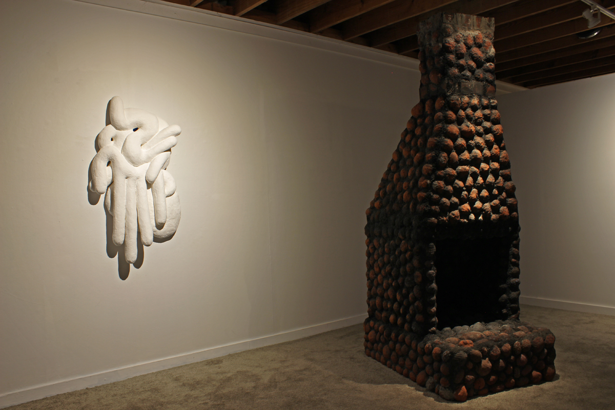 Lauren Clay, Hand of Devi , Paper pulp, plaster, paper mache, and wood, 2016, 48 x 24 inches Julia Gartrell, Cenotaph , North Carolina clay and charcoal, 2015, 100 x 48 x 36 inches