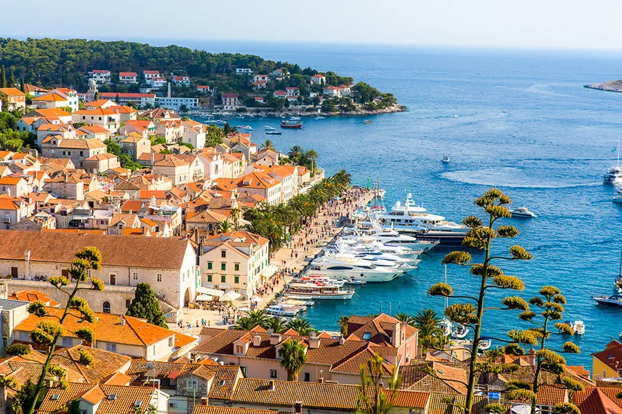 Croatian Coastline...can't wait to be on one of the boats below! Photo by Sail Croatia.