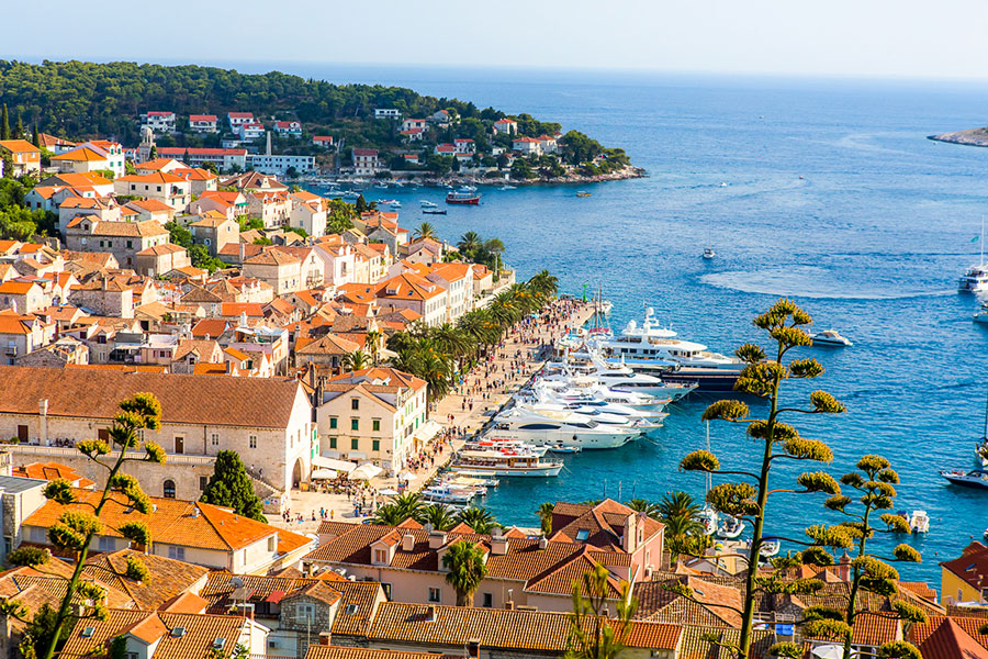 Croatian Coastline...can't wait to be on one of the boats below! Photo by Sail Croatia.