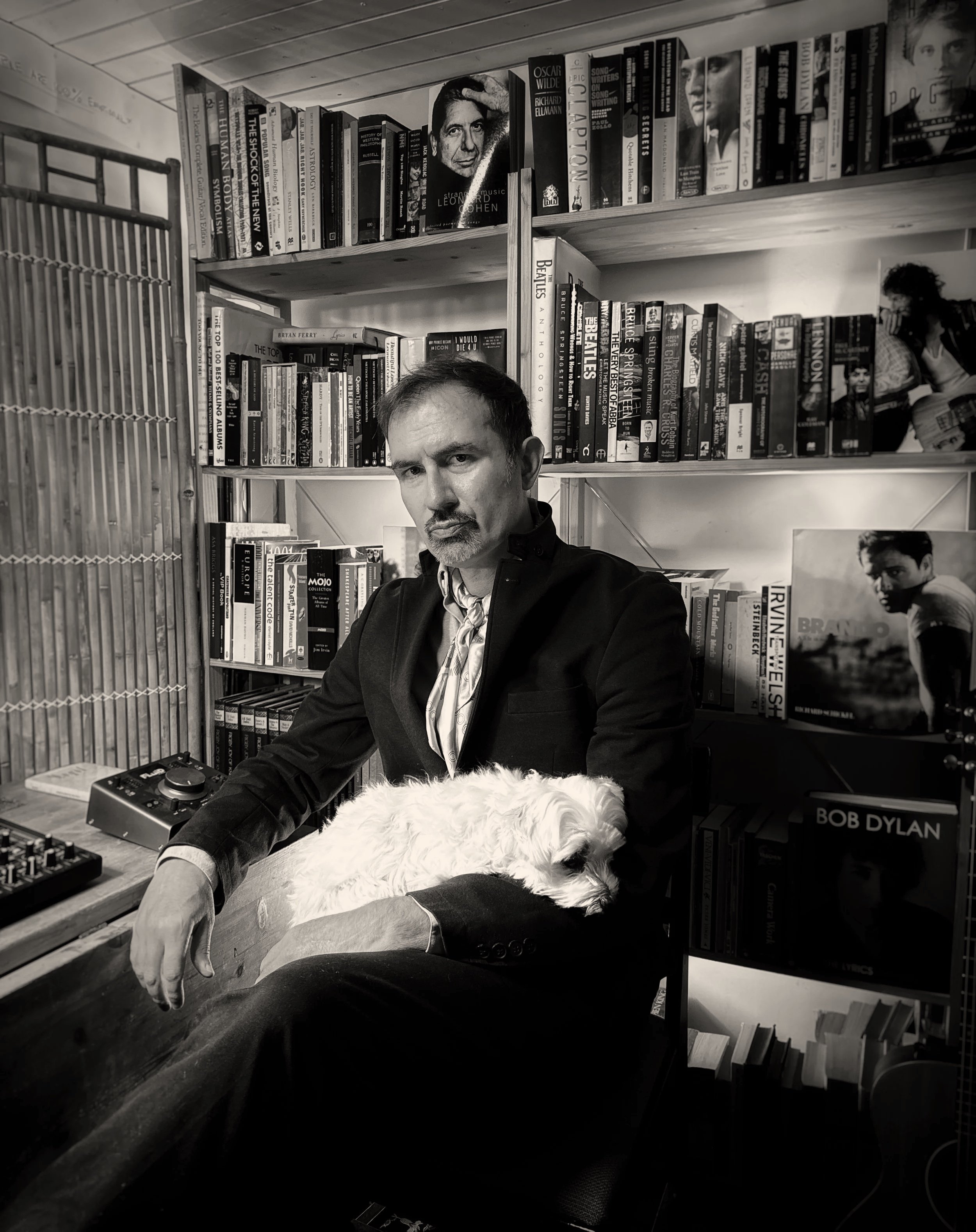 Jack Rubinacci in his studio with his beloved Maltese terrier Mr Fluffy