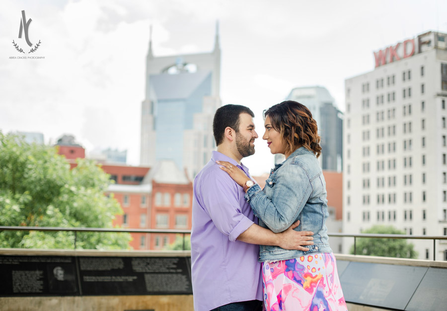 Engagement picture in front of the Nashville Skyline