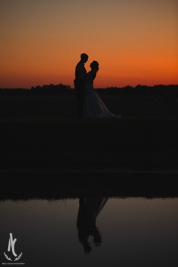 Bride and Groom silhouette at sunset in McKenzie Tennessee