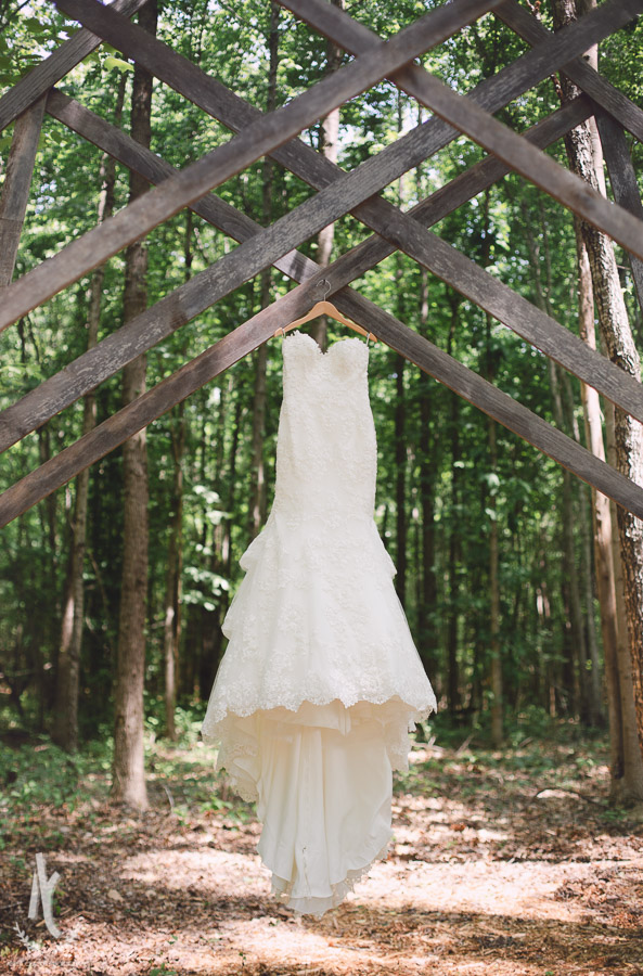 Wedding Dress hanging under the trees