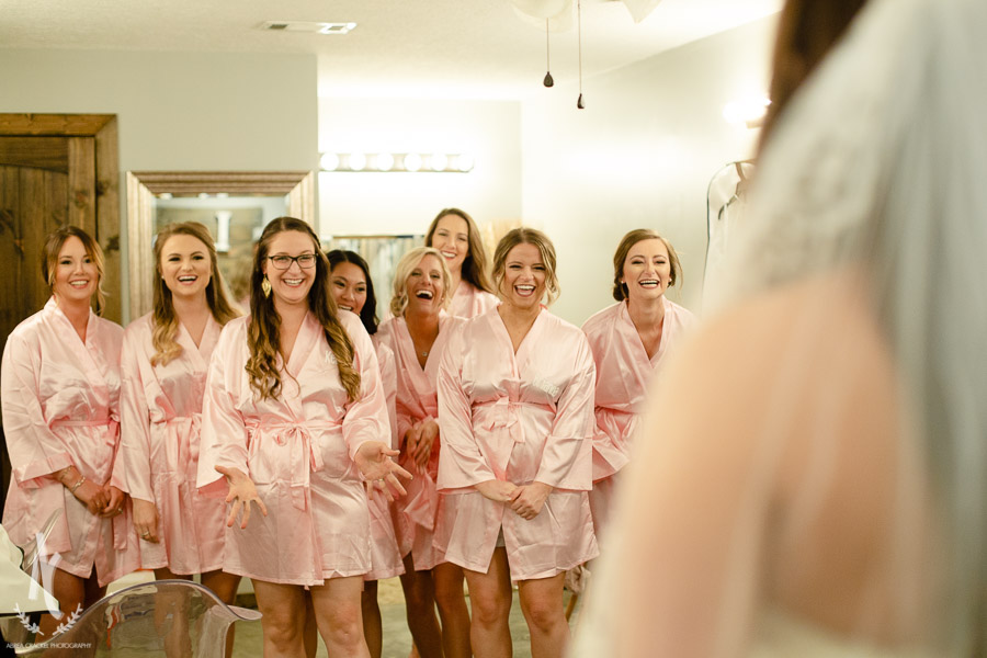 Bridesmaids first look with bride