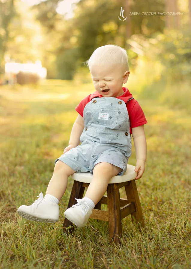  Life is rough sometimes, like when you have to sit on a stool for a picture. :) Bless him!  