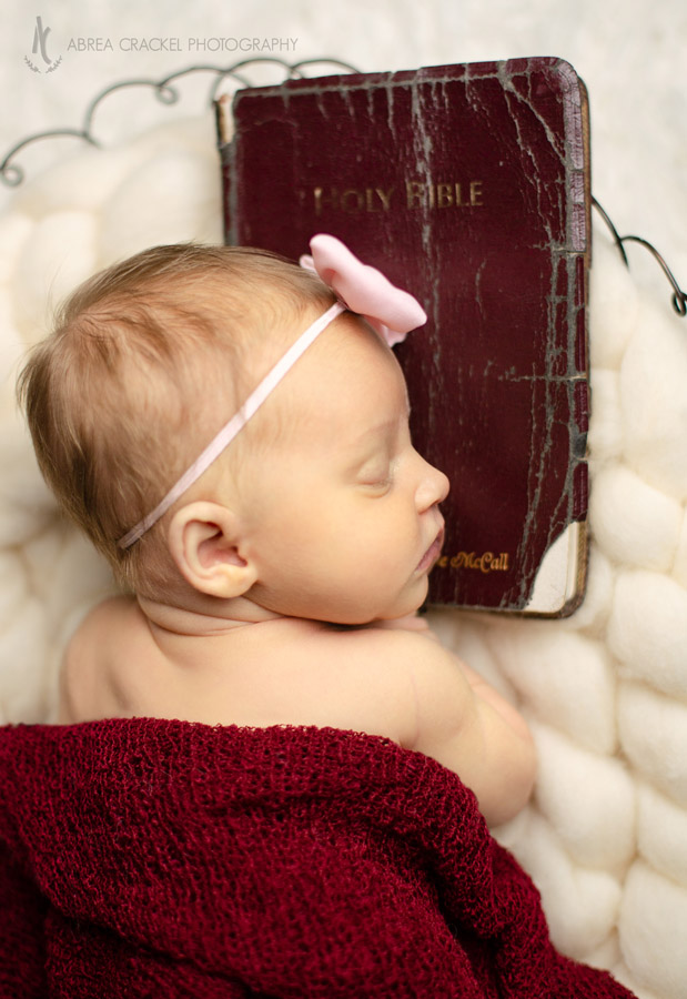 Resting on her dad's Bible