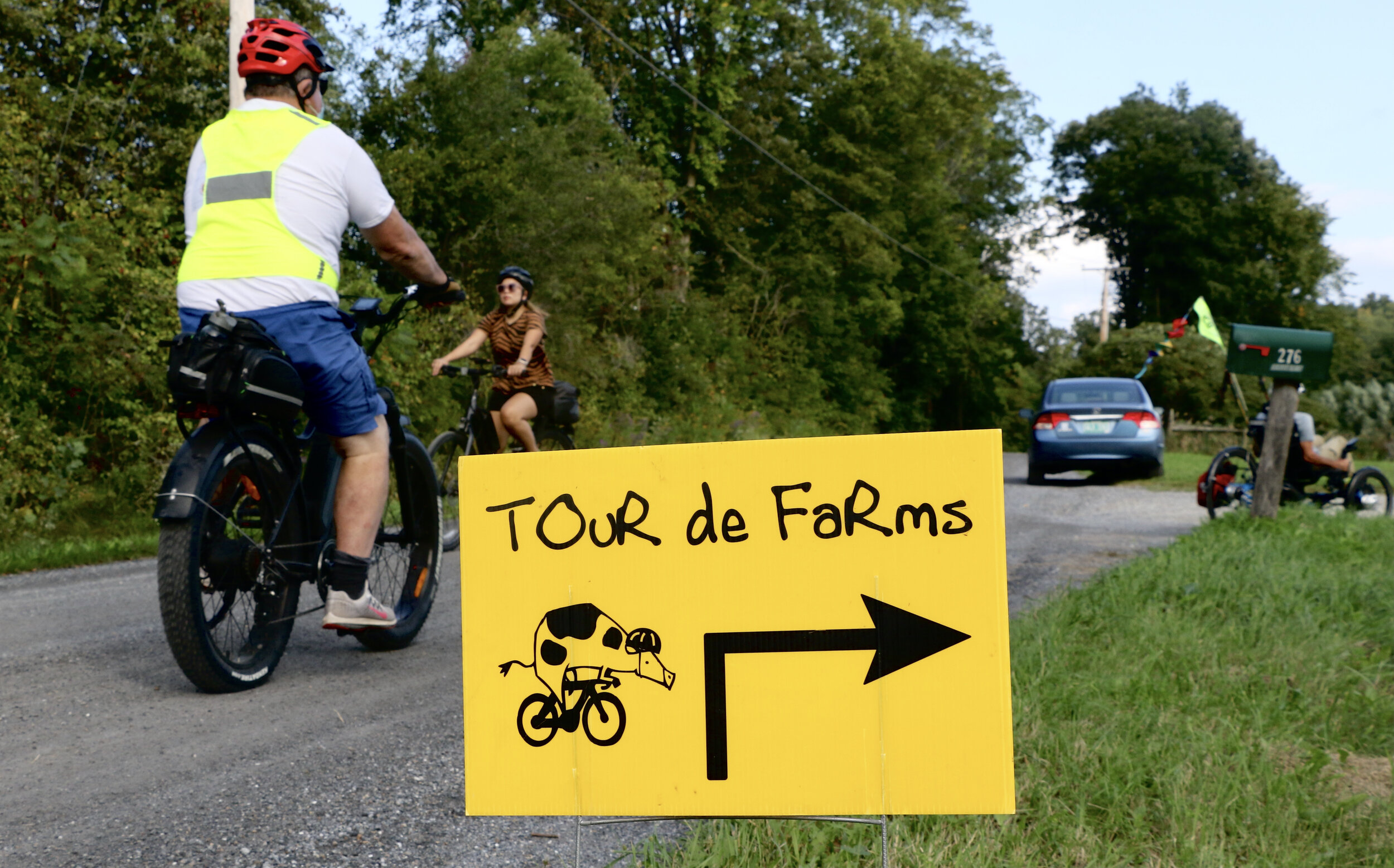 2021 TDF Sign and Riders.jpeg