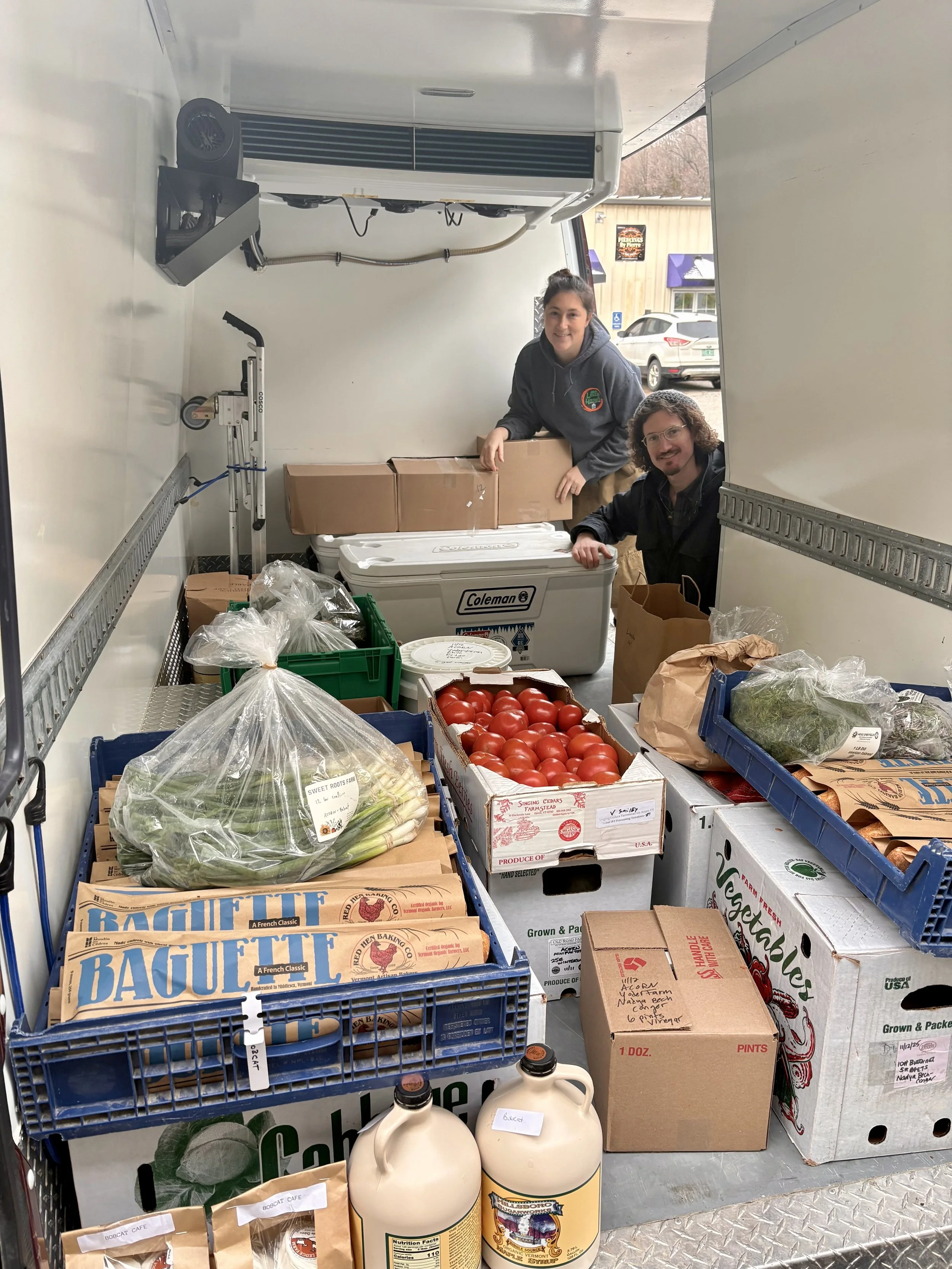 Abby and Alex with lots of food in van.jpg