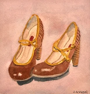 Once I had darkened the shoes themselves, I wanted more warmth in the background, so I added another very pale glaze of perylene maroon.