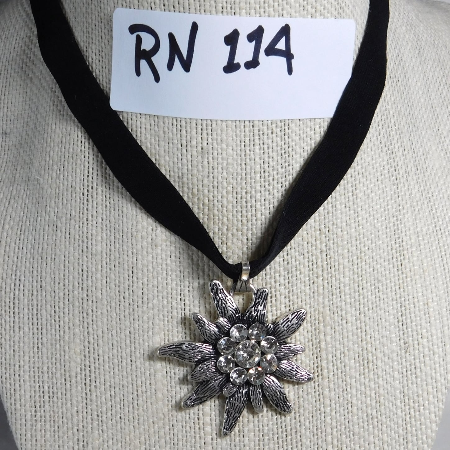  Black ribbon w/ starburst 1 1/2"; 12-15" 