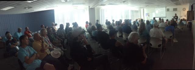 One of the day-time lecturers featuring the moons of Saturn with a full classroom! Image credit: Caitlin Ahrens