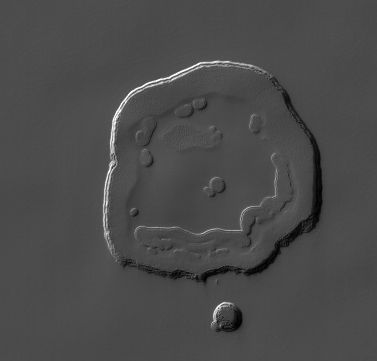 Dubbed by the Mars HiRISE team as "Happy Face". Credit: HiRISE.