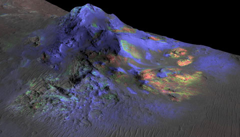 Glass (green), olivine (red), and pyroxene (blue) speckle this Alga Crater central peak. Credit: NASA/JPL-Caltech/JHUAPL/University of Arizona