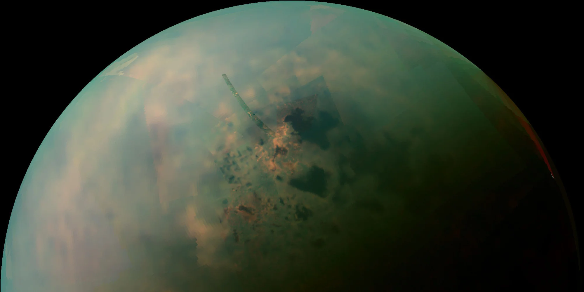 Titan as viewed by Cassini. Darker patches are lake regions. Image credit: NASA/JPL