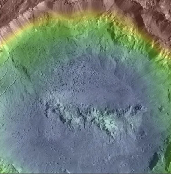 Colorized topographic map of Haulani crater. Note the landsliding and pitting of the crater walls and floor! Image credit: NASA/MPS/PSI/Thomas Platz