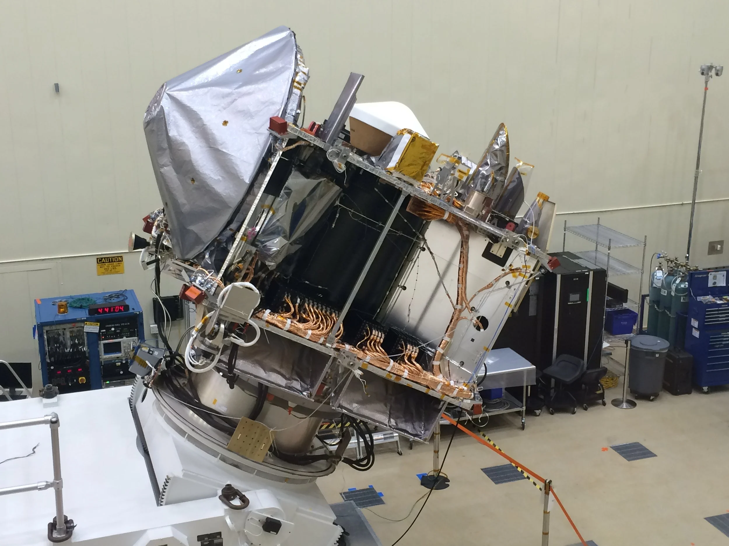 OSIRIS-REx in the clean room at Lockheed Martin in April 2016 after the completion of testing and the final stowage of the TAGSAM arm. Image credit: University of Arizona/Christine Hoekenga