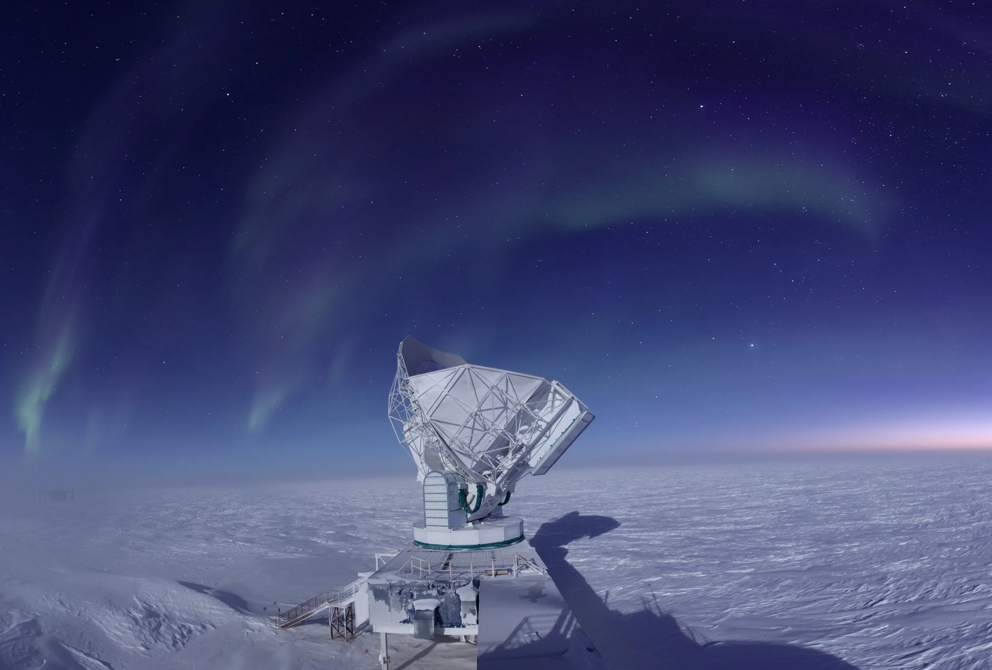 The South Pole Telescope measures the cosmic microwave background! Photo: Jason Gallicchio