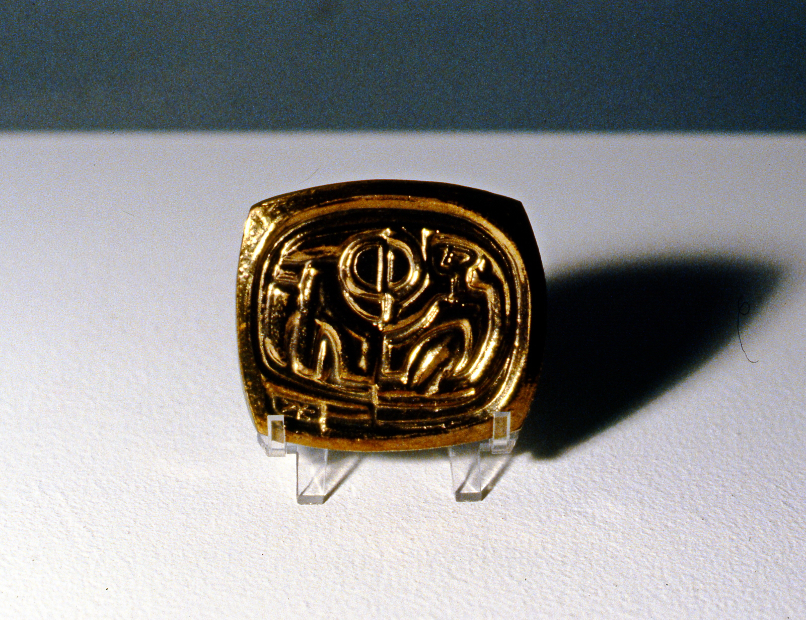 Moon Raker , 1993/4, Zeljko Kujundzic, relief stoneware medal, 7.5 x 10 cm, 1999.03.02, gift of the estate of June Brock