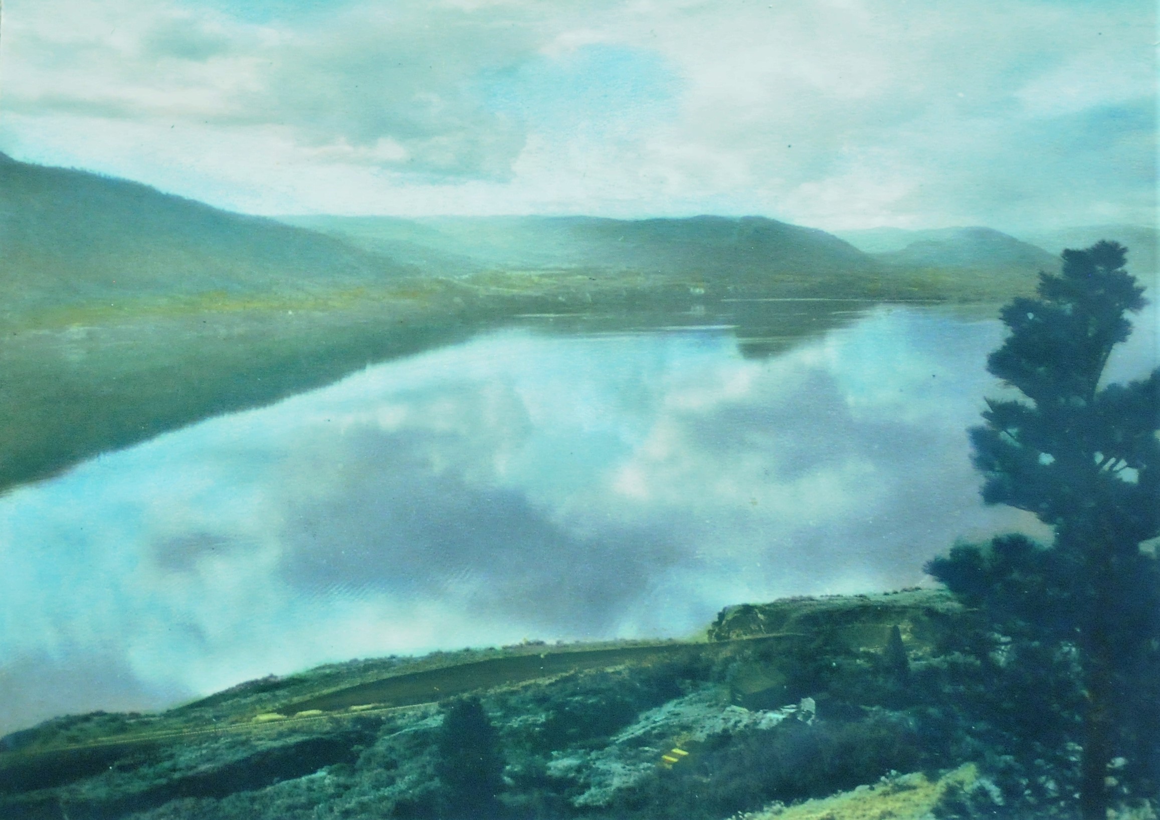 Okanagan Lake, 1933, Victor Russell, tinted photograph, 17.5 x 24.5 cm, 2007.03.11. Gift of Kirsten & Ron Candy.