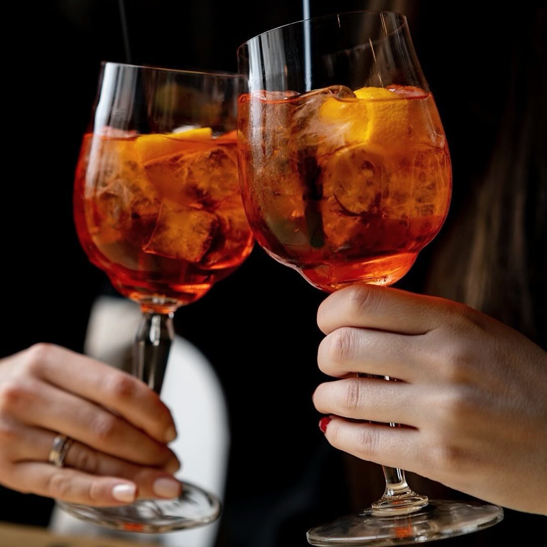 Join us this Sunday at @biceorlando to savor the vibrant flavors of Italy with our signature Aperol Spritz! 🍹✨ #sundayfunday 

As you soak in the picturesque views of Portofino Bay, enjoy the refreshing blend of Aperol, prosecco, and a splash of sod