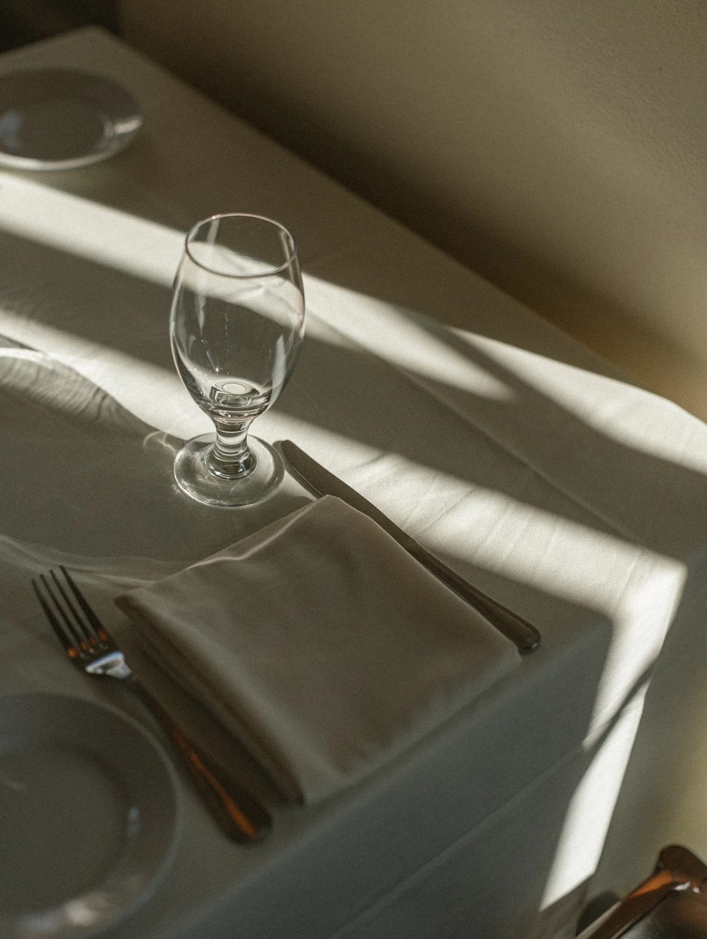 Soft afternoon light across crisp linens, polished silver, and a perfectly set table, a quiet moment before the evening begins.

Because true Italian dining is not only about the plate,
it is about the beauty of every detail.
&bull;&bull;&bull;

#bic